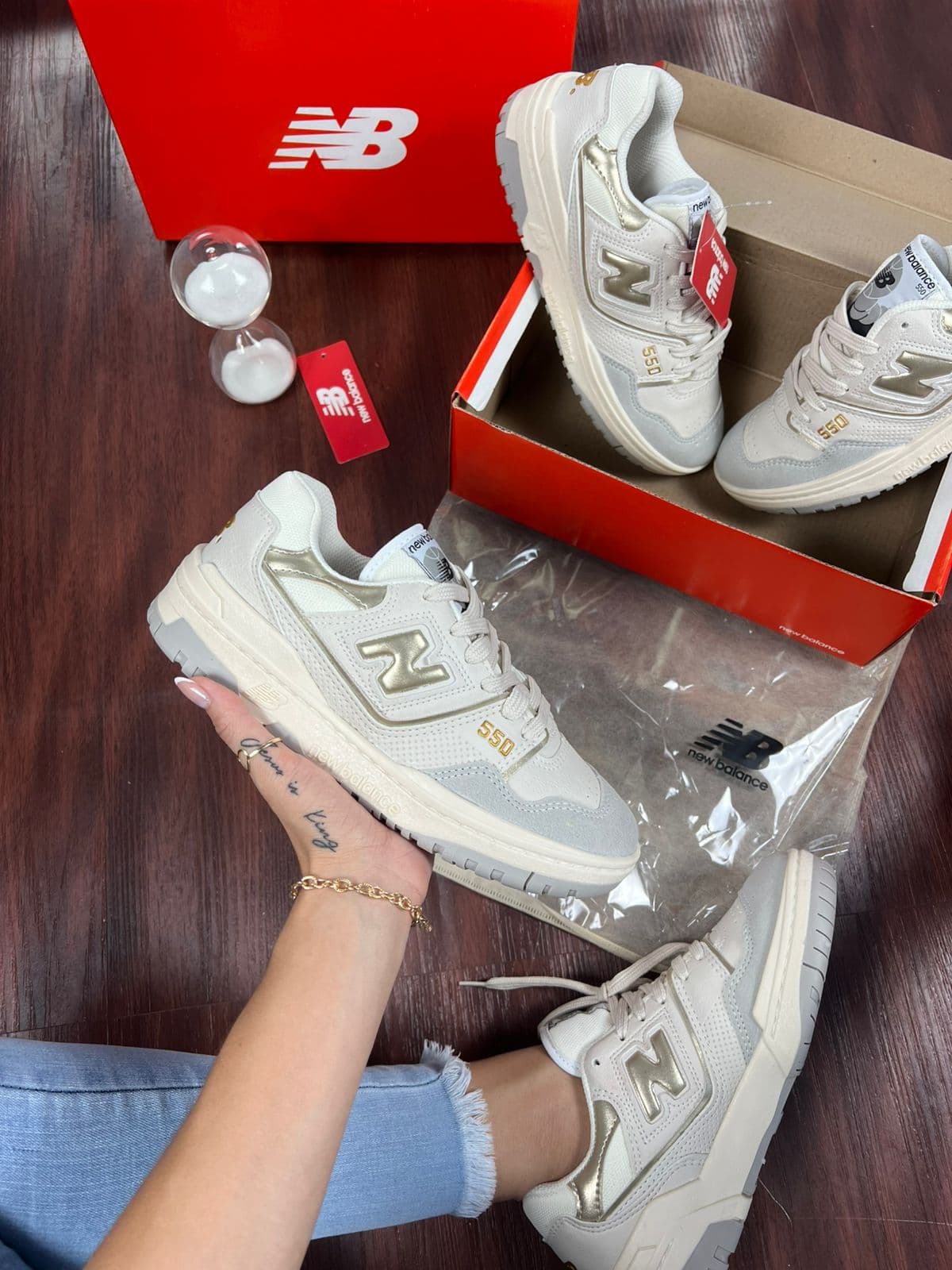 New Balance Off/ouro — foto principal
